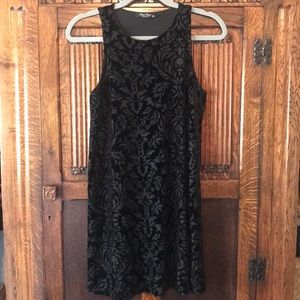 Black velour sleeveless swing dress